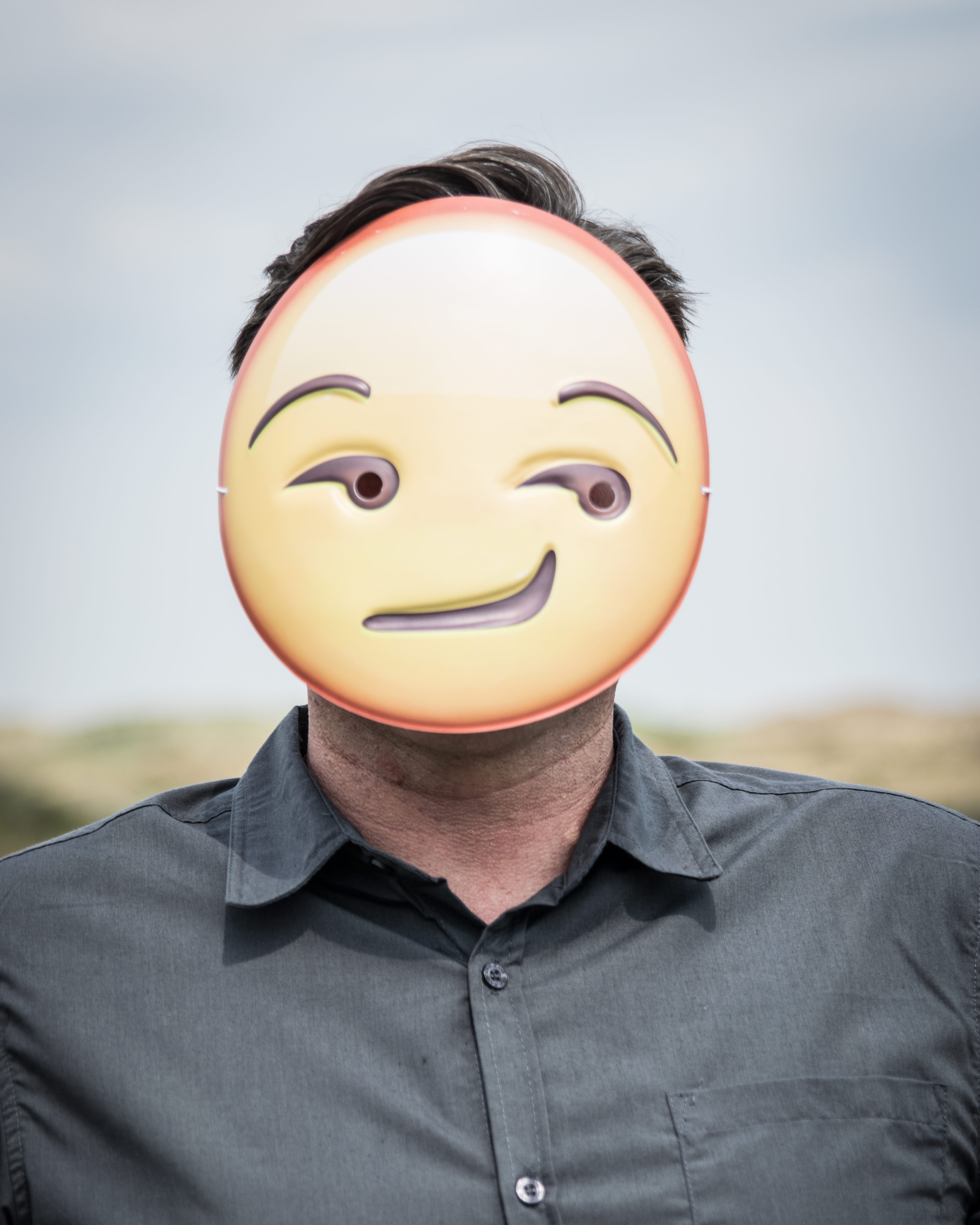 Emoji Emoticon masker Grijns